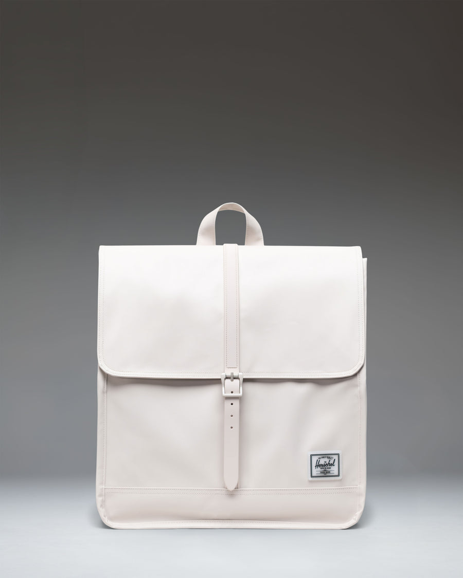 Herschel Supply Co. City Backpack in Moonbeam Tonal, showing the front view with a single strap closure and a clean, minimalist design.
