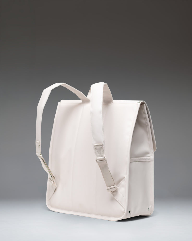 Herschel Supply Co. City Backpack in Moonbeam Tonal, featuring a minimalist rectangular design with a single strap magnetic closure.