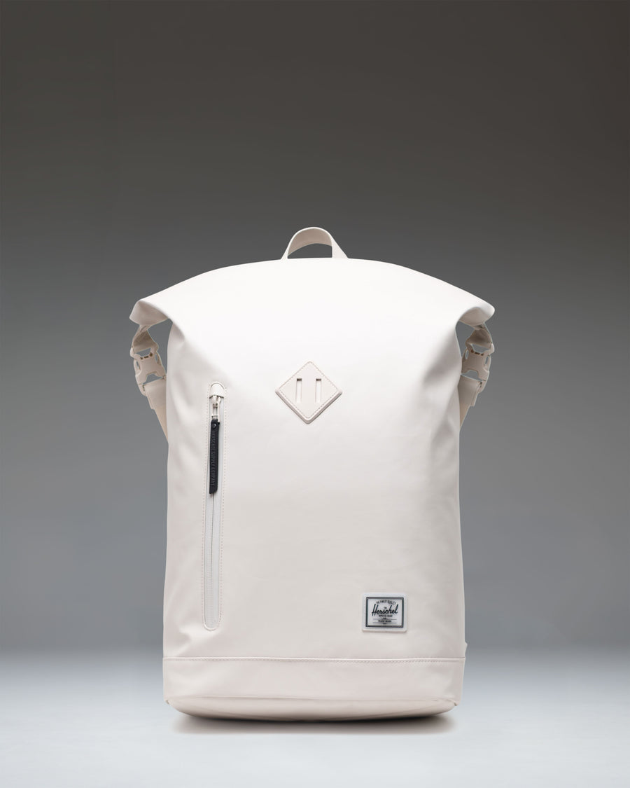 Herschel Supply Co. Roll Top Backpack in Moonbeam Tonal, showing the front view with adjustable straps and clean minimalist design.