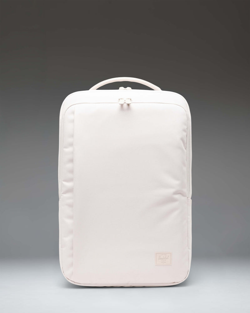 Herschel Supply Co. Kaslo Backpack Tech in Moonbeam Tonal beige. Features multiple zippered compartments and side water bottle pockets.