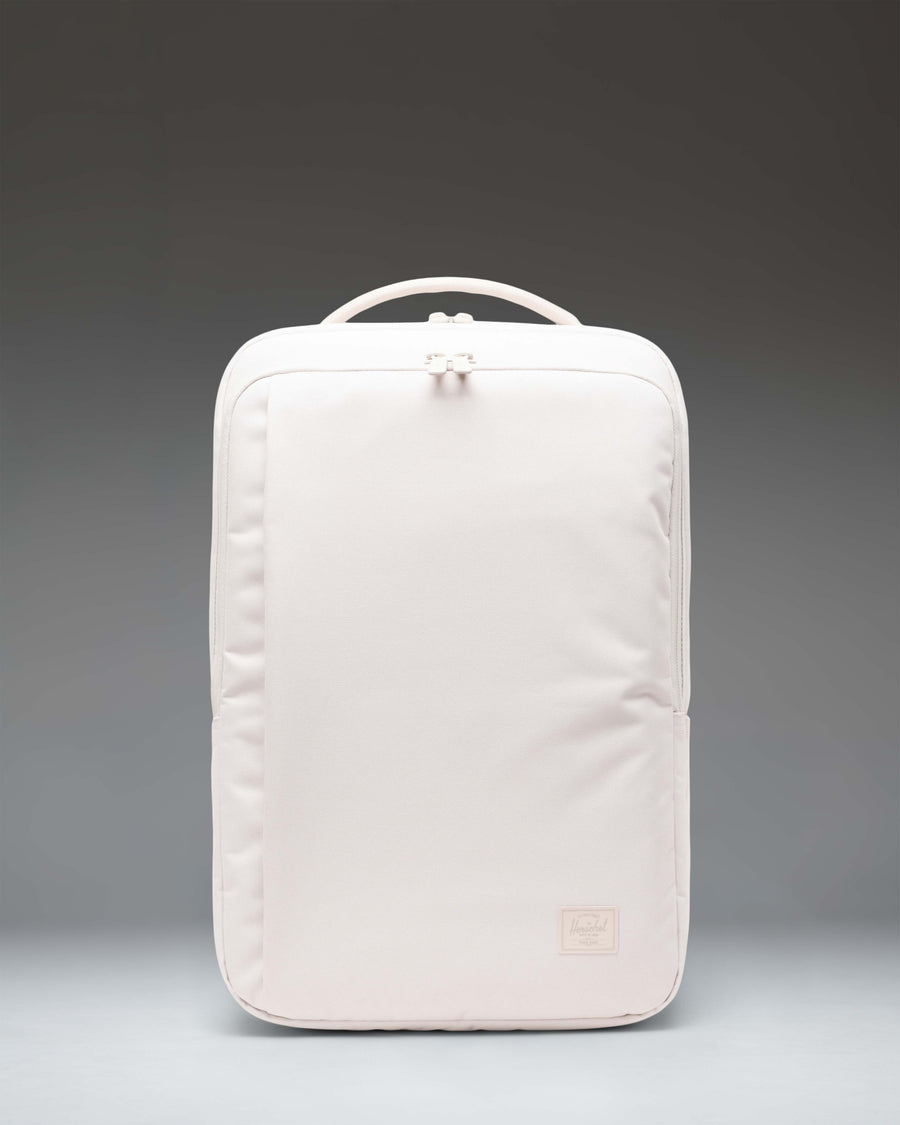 Herschel Supply Co. Kaslo Backpack Tech in Moonbeam Tonal beige. Features multiple zippered compartments and side water bottle pockets.