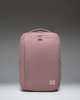 Herschel Supply Co. Kaslo Daypack Tech in Ash Rose Tonal, showing a front view of the minimalist pink tech backpack.