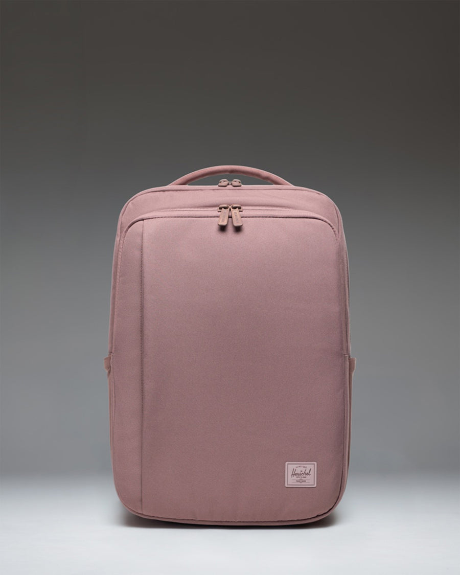 Herschel Supply Co. Kaslo Daypack Tech in Ash Rose Tonal, showing a front view of the minimalist pink tech backpack.
