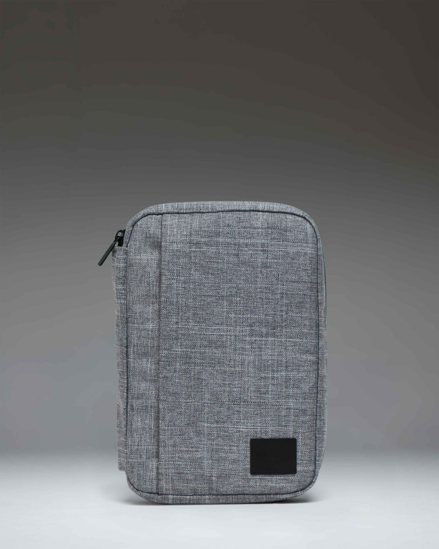 Herschel Supply Co Burrard Organizer Tech in Raven Crosshatch grey fabric, shown open with organized tech accessories.