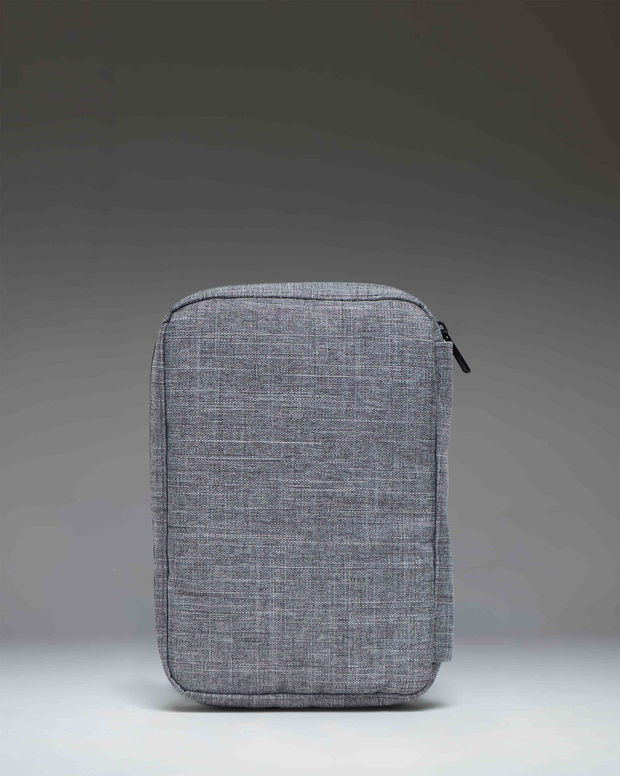 Herschel Supply Co. Burrard Organizer Tech in Raven Crosshatch, showing a detailed close-up of the textured grey fabric and zipper.
