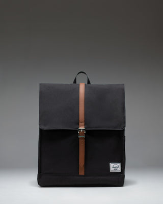 Herschel Supply Co. City Backpack in black, featuring a clean, minimalist design with a single strap closure and front storage sleeve.