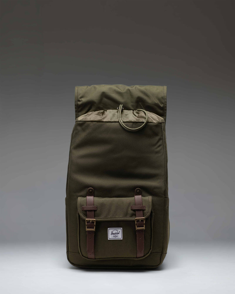 Herschel Little America Mid Backpack in Ivy Green featuring dual rubber straps, a front pocket, and the classic woven label.
