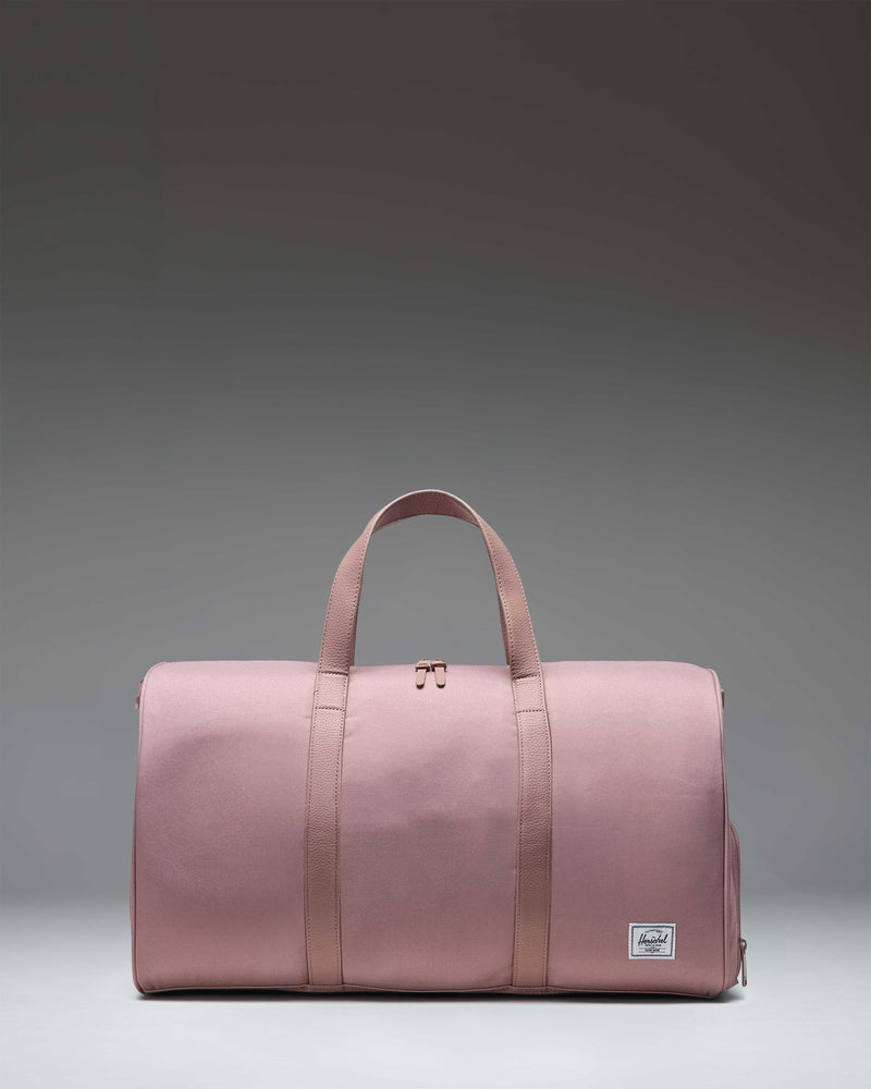Herschel Supply Co. Novel Duffle bag in Ash Rose.
