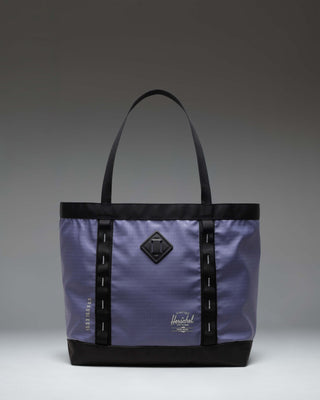 Herschel Supply Co. All Season Gear Tote 33 L in Heron/Black, showing the durable dual-tone design and carrying handles.