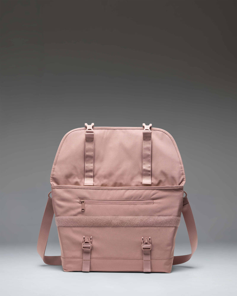 Herschel Supply Co. Cove Messenger bag in Ash Rose pink.