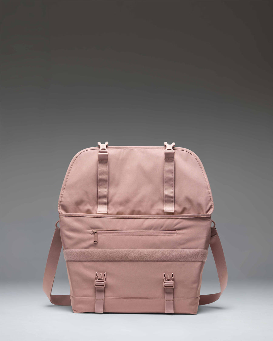 Herschel Supply Co. Cove Messenger bag in Ash Rose pink.