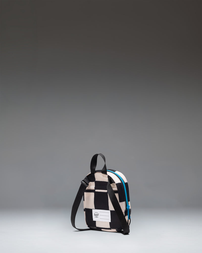 Herschel Heritage Crossbody Little Herschel in Check This Hawaiian Surf pattern, a blue checkered bag with a palm tree graphic.