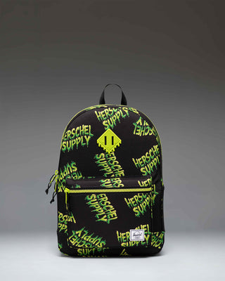 Herschel Heritage Youth Backpack in HSC Slime green featuring a classic diamond accent, zippered front pocket, and mesh water bottle pocket.