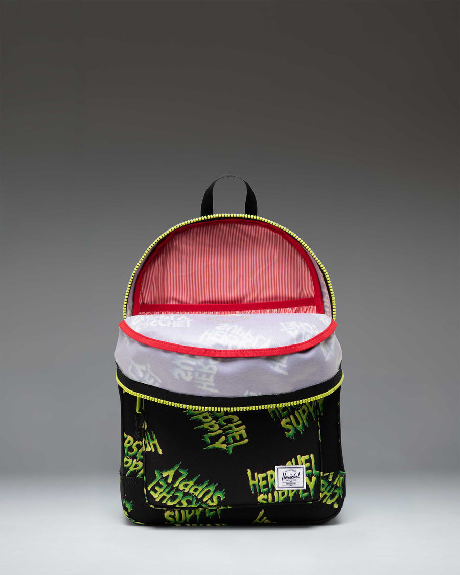 Herschel Heritage Youth Backpack in HSC Slime green, showcasing a classic design with a front pocket and signature diamond accent.