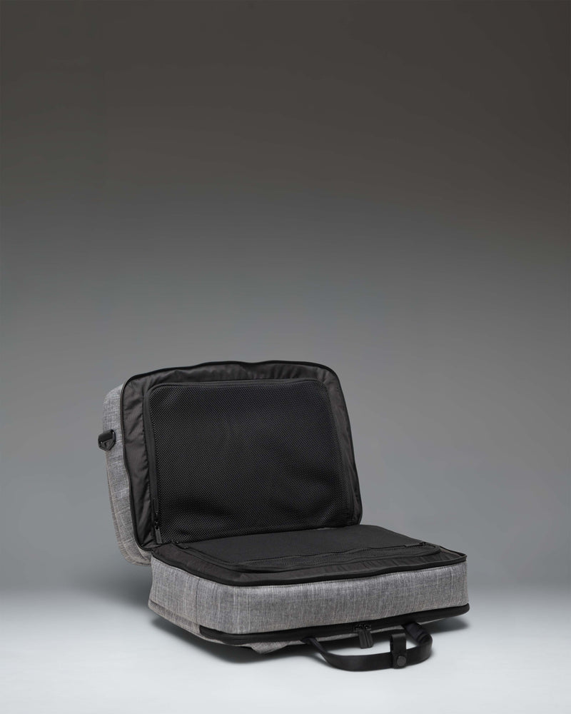 Herschel Supply Co. Bowen Convertible Travel Duffle Tech bag in Raven Crosshatch grey fabric, shown against a plain backdrop.