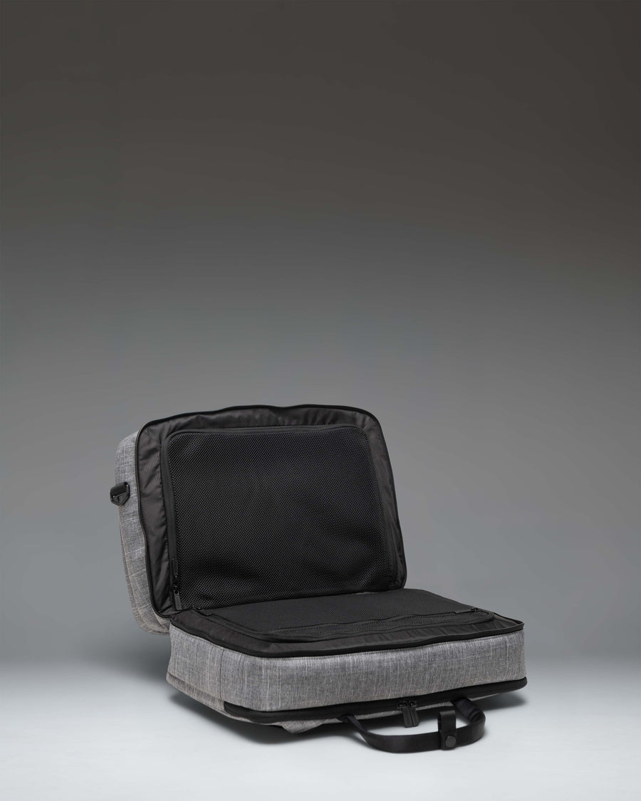 Herschel Supply Co. Bowen Convertible Travel Duffle Tech bag in Raven Crosshatch grey fabric, shown against a plain backdrop.
