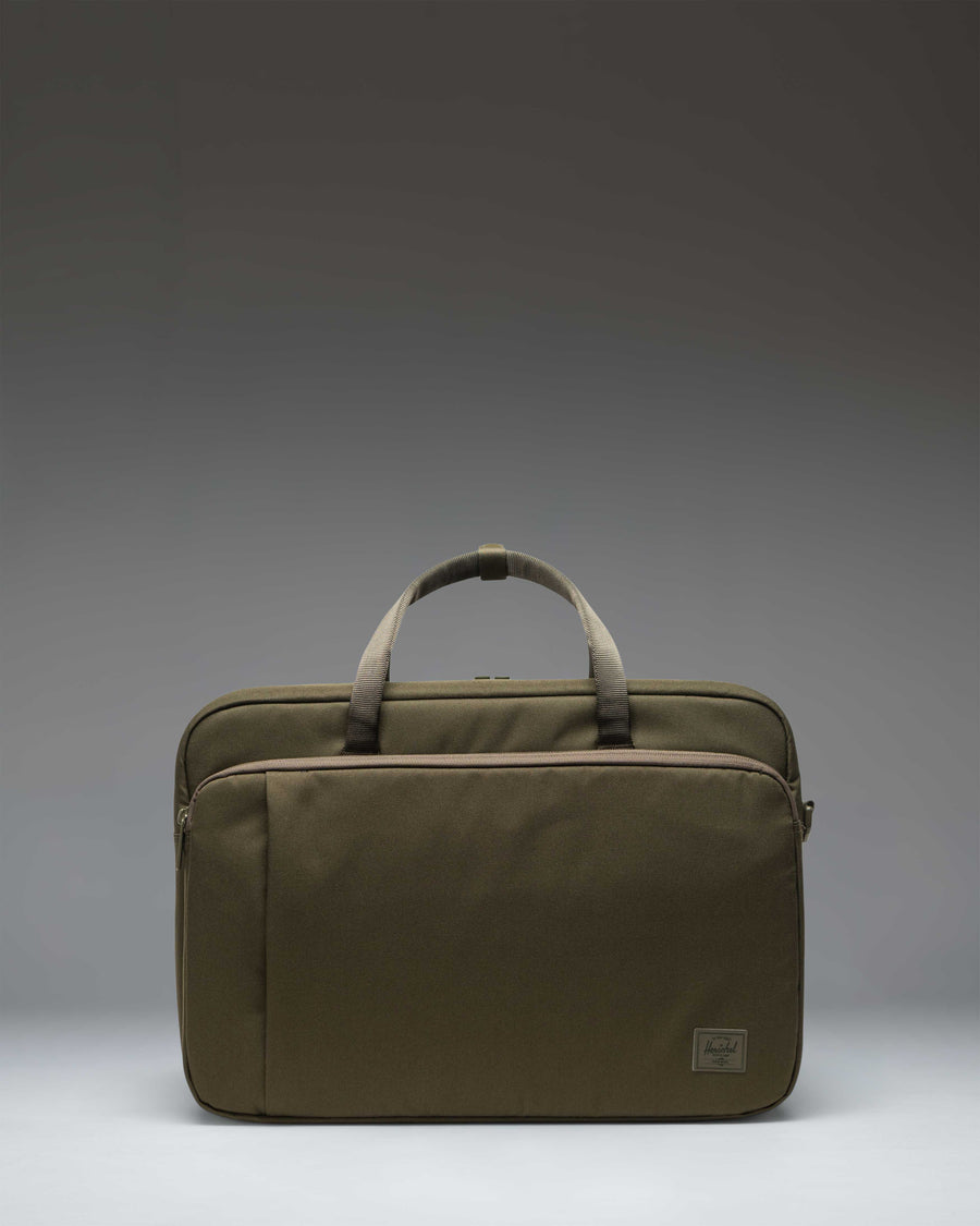 Herschel Supply Co. Bowen Convertible Travel Duffle Tech in Ivy Green Tonal, showing the front view with straps and handles.
