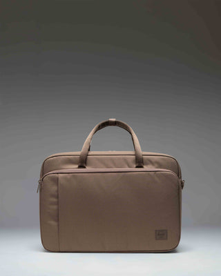Herschel Supply Co. Bowen Convertible Travel Duffle Tech bag in light brown, shown from the front with backpack straps attached.