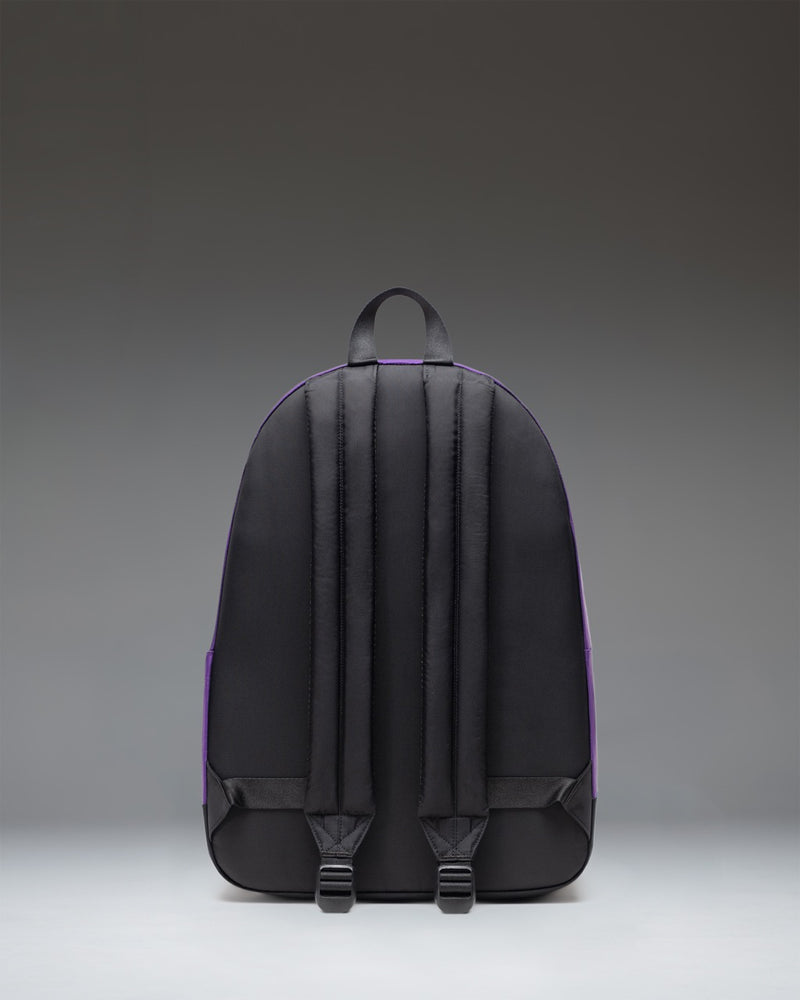 Herschel Classic XL Backpack in deep burgundy Acai color, featuring a clean design with a front storage pocket and classic woven label.
