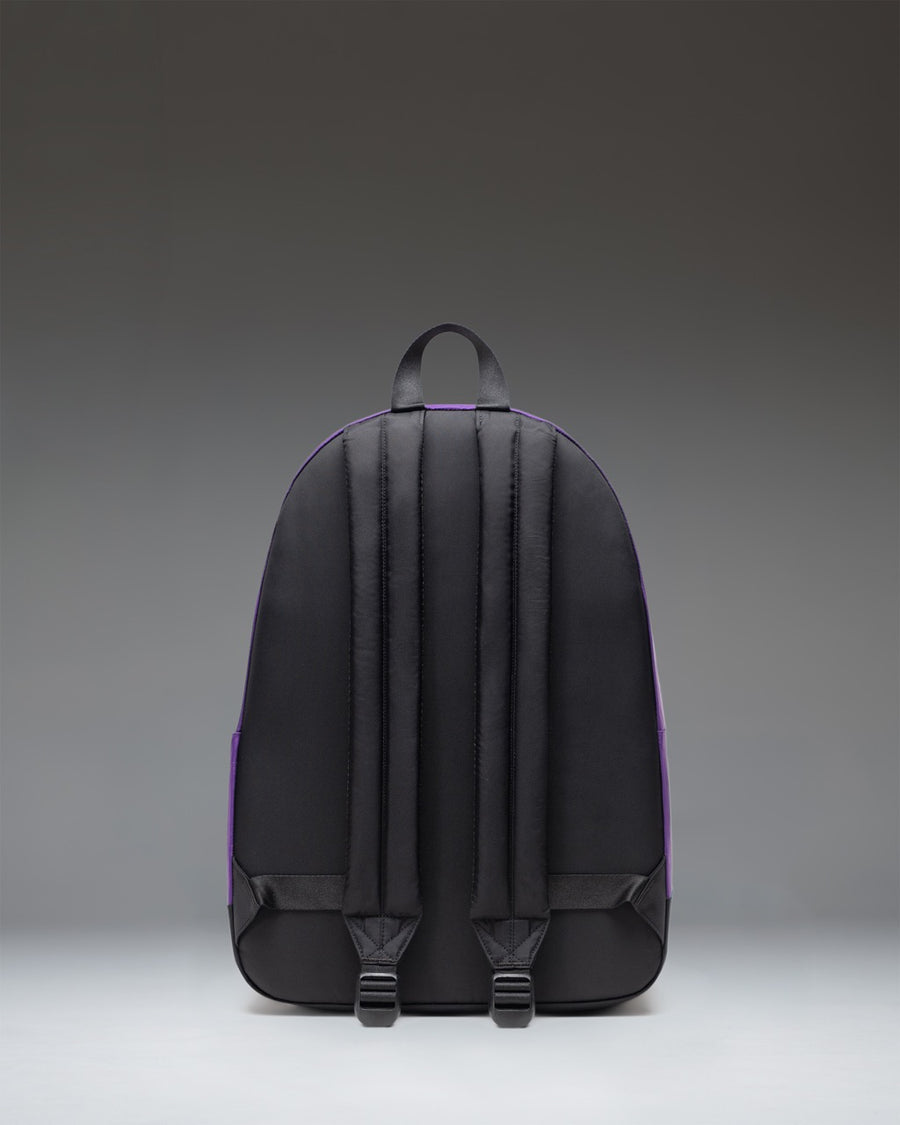 Herschel Classic XL Backpack in deep burgundy Acai color, featuring a clean design with a front storage pocket and classic woven label.
