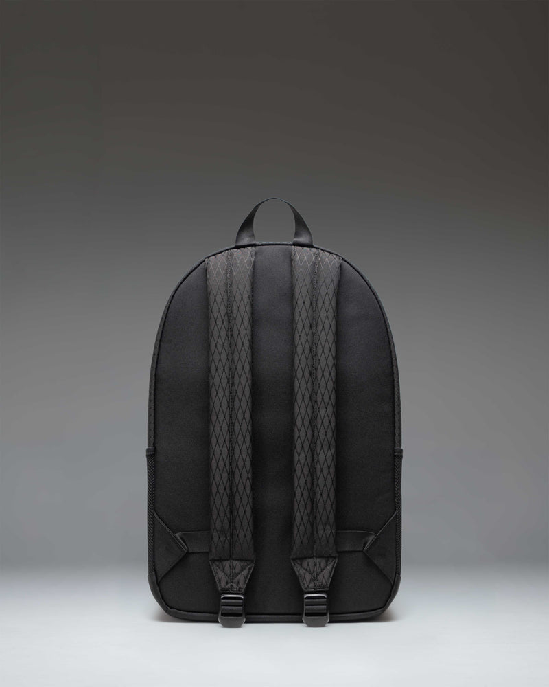 Herschel Supply Co. Kaine Backpack in Black Diamond/Black featuring a spacious design with mesh side pockets and dual adjustable shoulder straps.