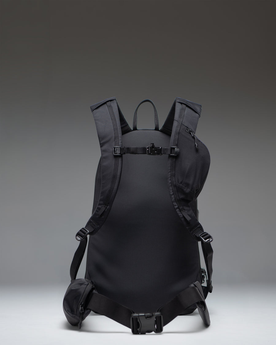 Herschel Supply Co. All Season Resort Backpack 14L in Black shown from the side to highlight its sleek, slim profile and durable fabric.