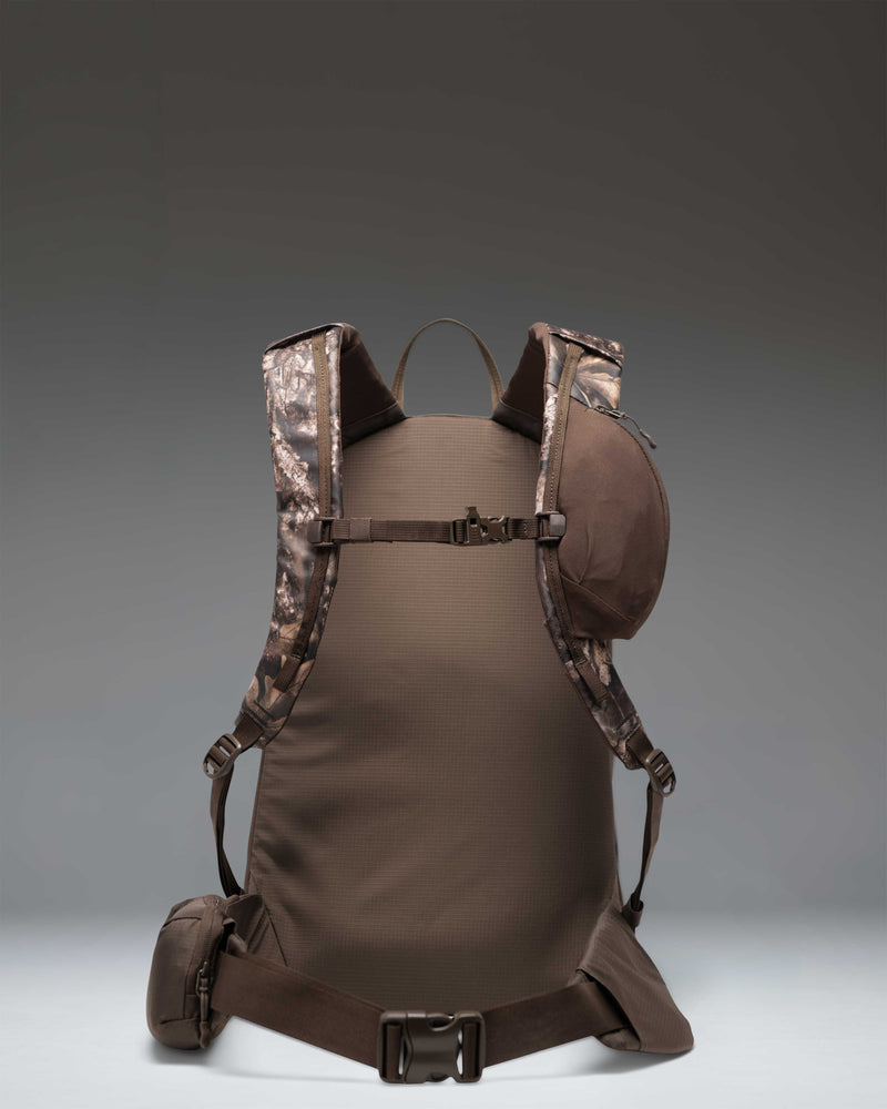 Herschel Supply Co. Realtree All Season Resort Backpack 14L in Realtree APX Camo pattern, showing a close-up of the front pocket.