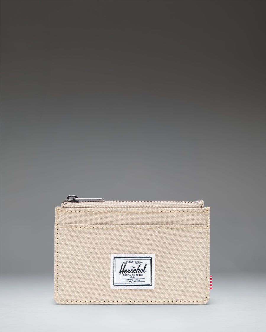 Herschel Supply Co. Oscar Cardholder wallet in Eucalyptus green.