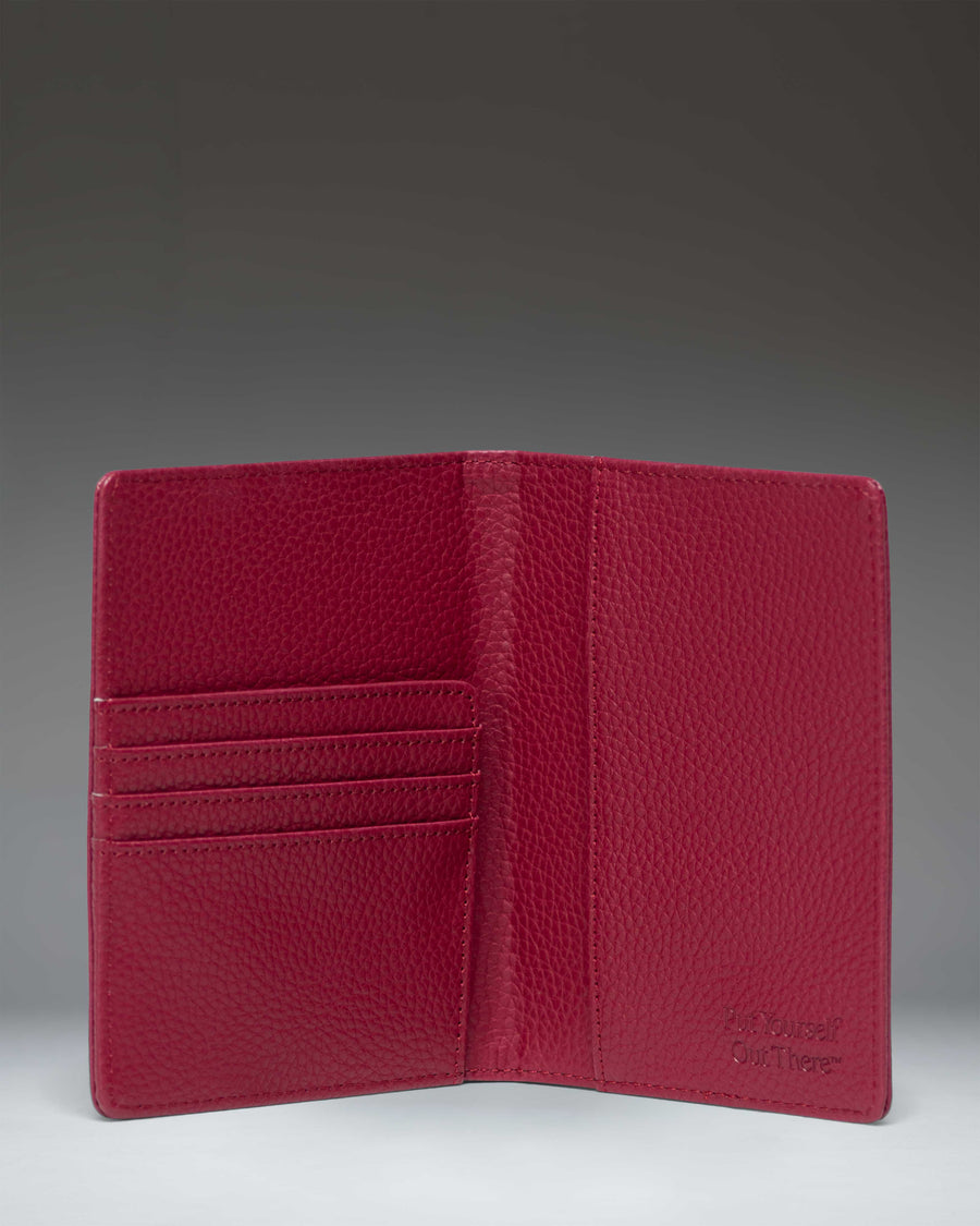 Herschel Supply Co Raynor Passport Holder in Cherry Red vegan leather.