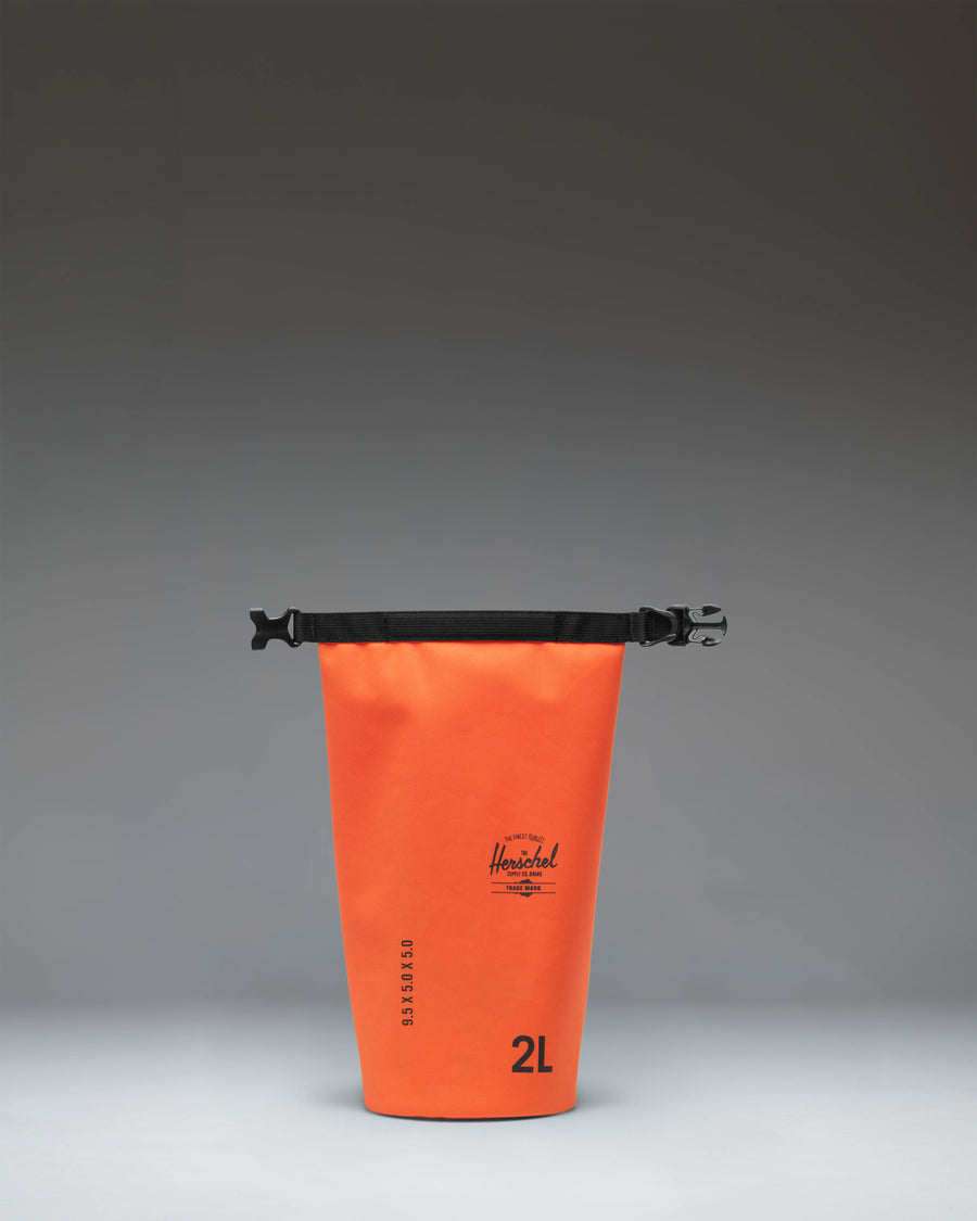 Herschel Supply Co Dry Bag Organizer 2L in Vermillion Orange showing its dimensions: 10 inches high by 6.75 inches wide.