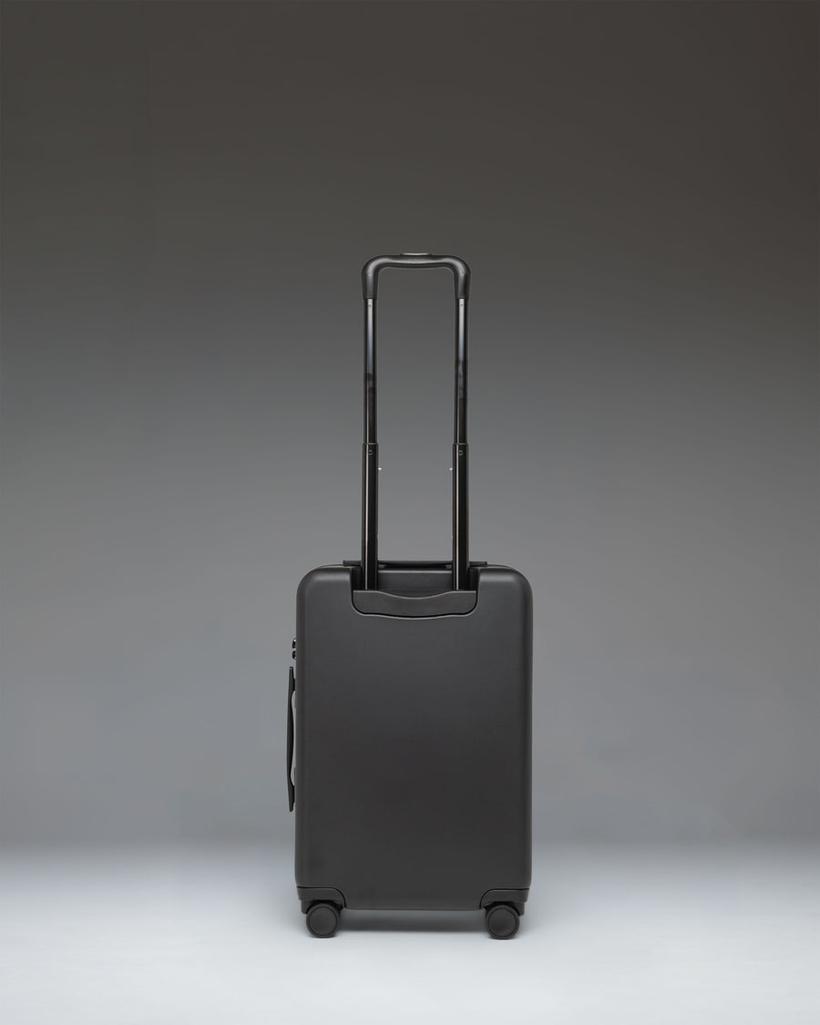 Herschel Heritage Hardshell Pro Large Carry On luggage in black.