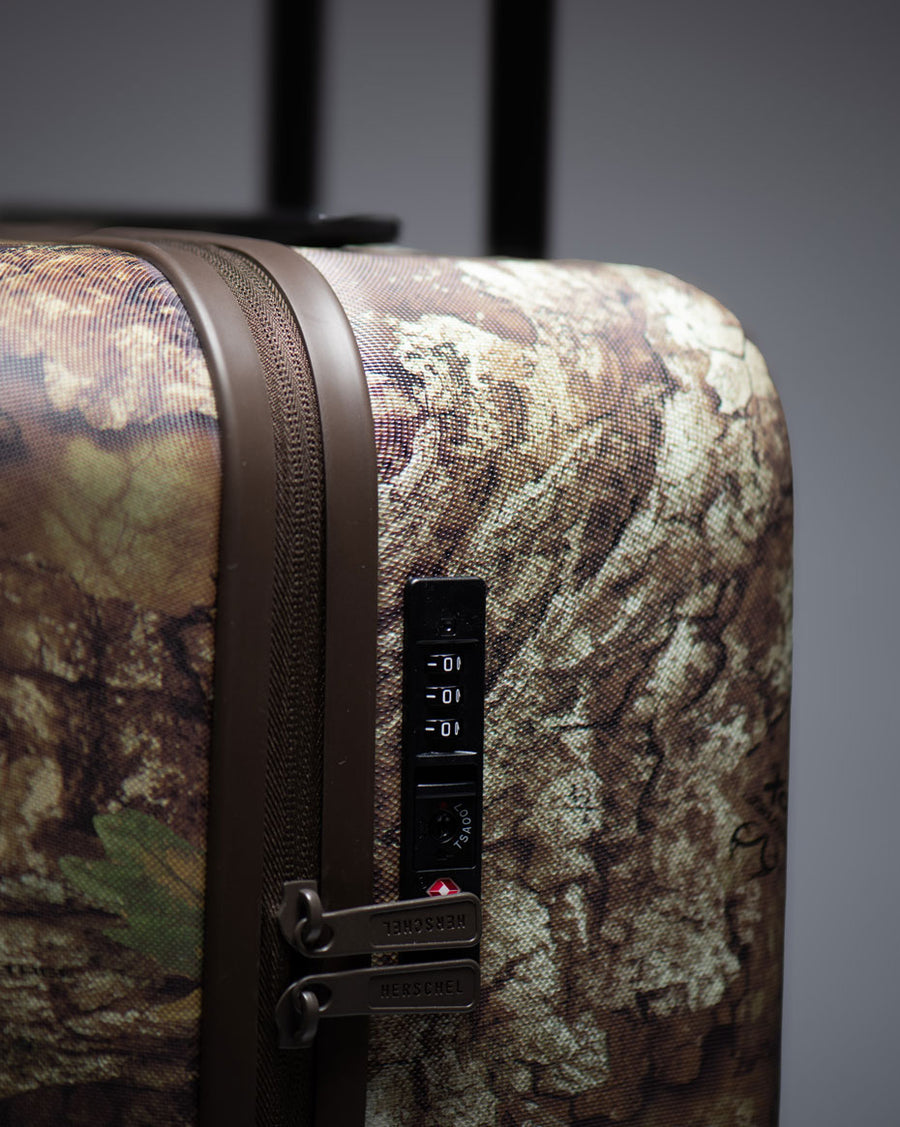 Herschel Heritage Medium Luggage in Realtree APX Camo.