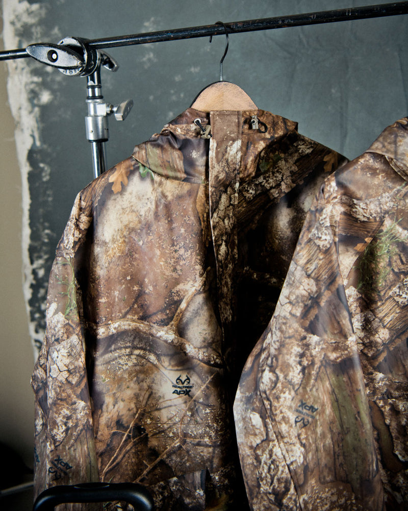 Herschel Supply Co. Women's Realtree Skeena Raincoat in Realtree APX Camo.