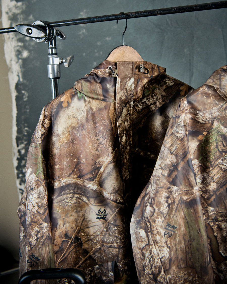 Herschel Supply Co. Women's Realtree Skeena Raincoat in Realtree APX Camo.