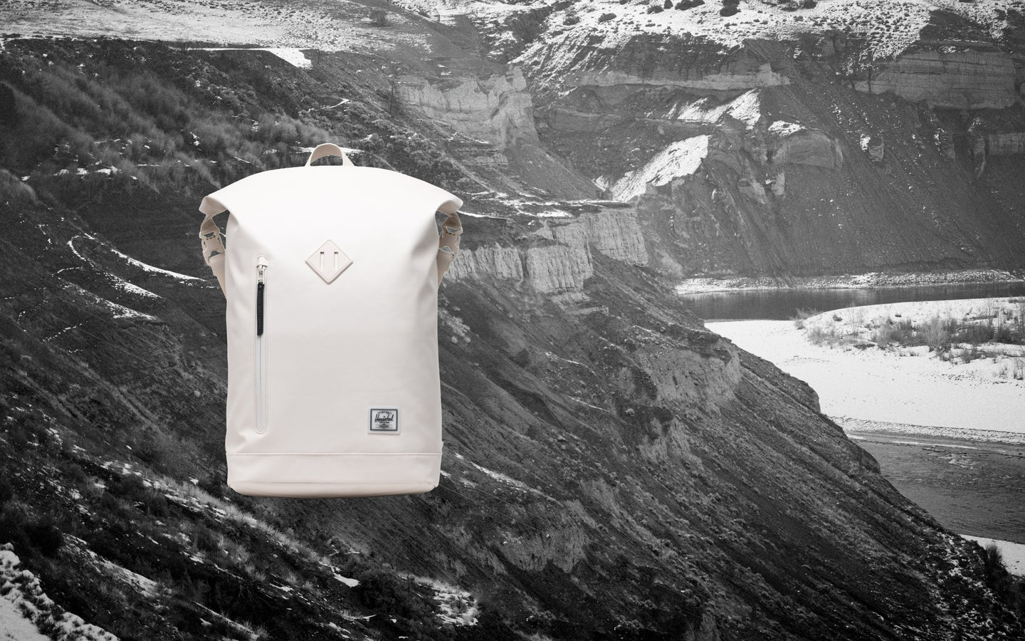 Herschel Supply Co. Weather Resistant Roll Top Backpack in Moonbeam Tonal displayed against a light gray background.