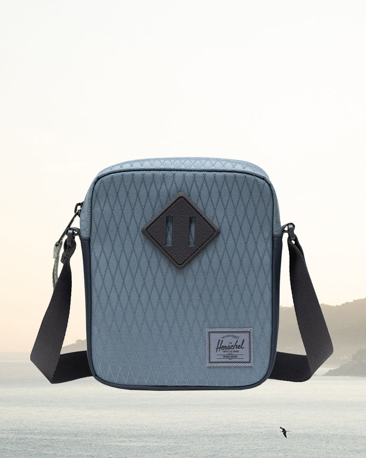Herschel Heritage Crossbody bag in Blue Mirage Diamond and Sea Storm.