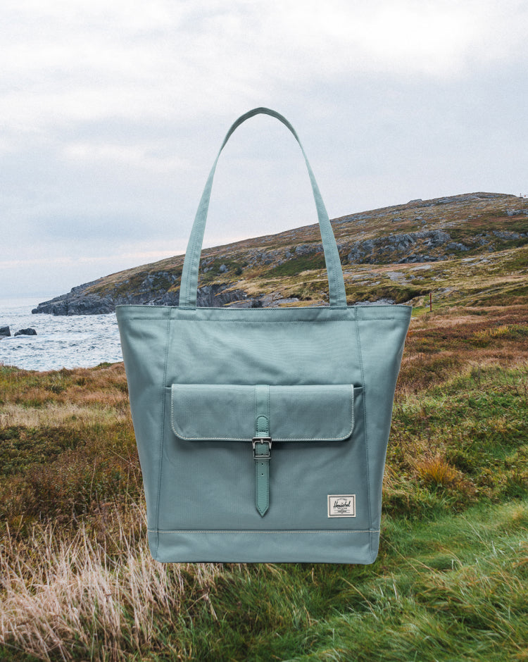 Herschel Supply Co. Retreat Tote bag in multicolor lifestyle view.