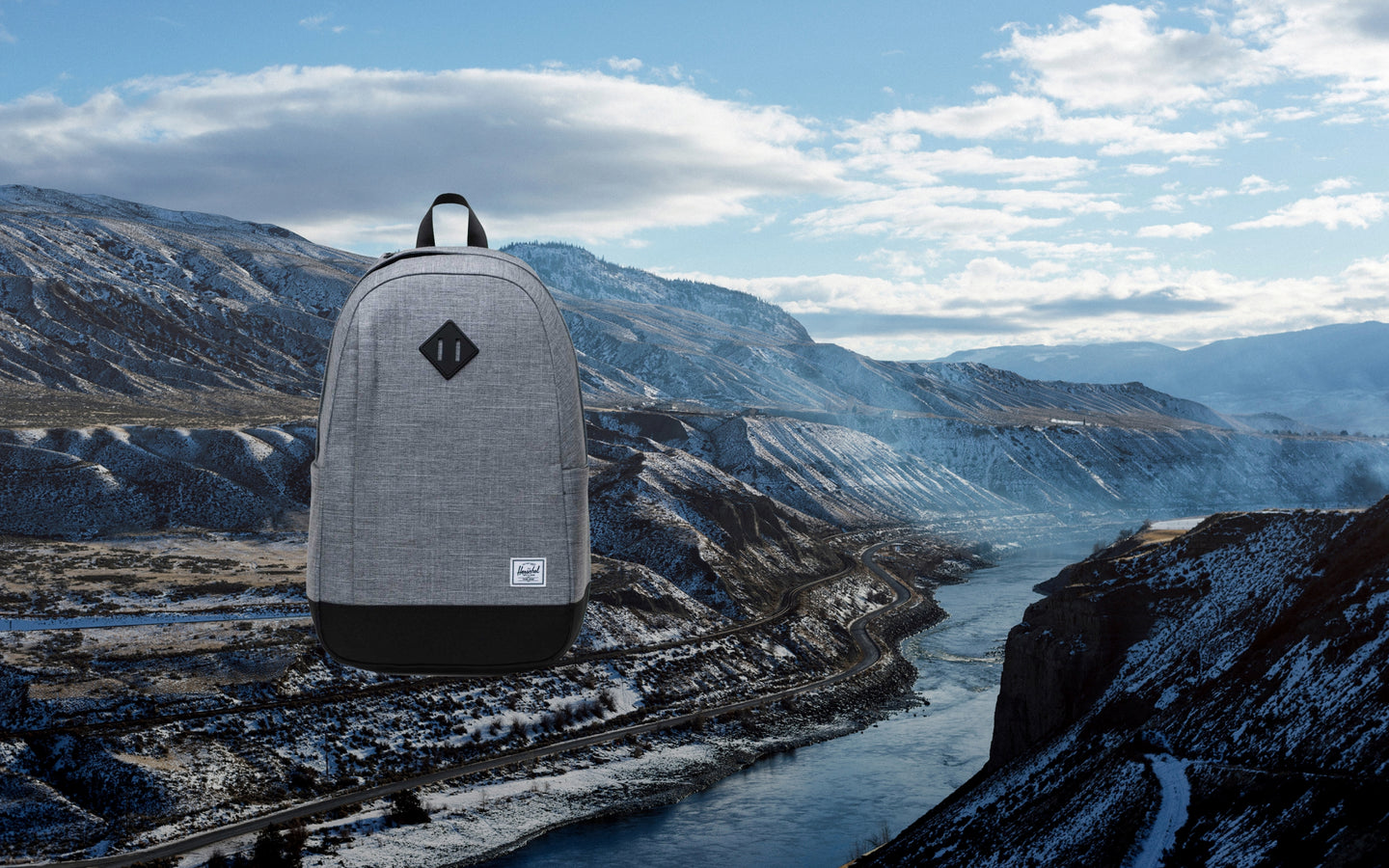 Herschel Seymour Backpack in Raven Crosshatch grey shown from the front.