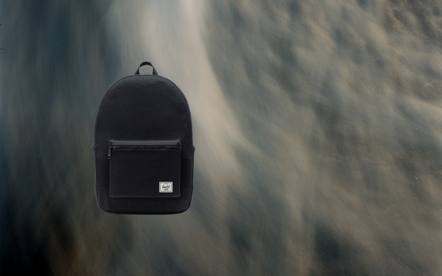 Herschel Supply Co. Pacific Daypack in black, displayed on a clean background.