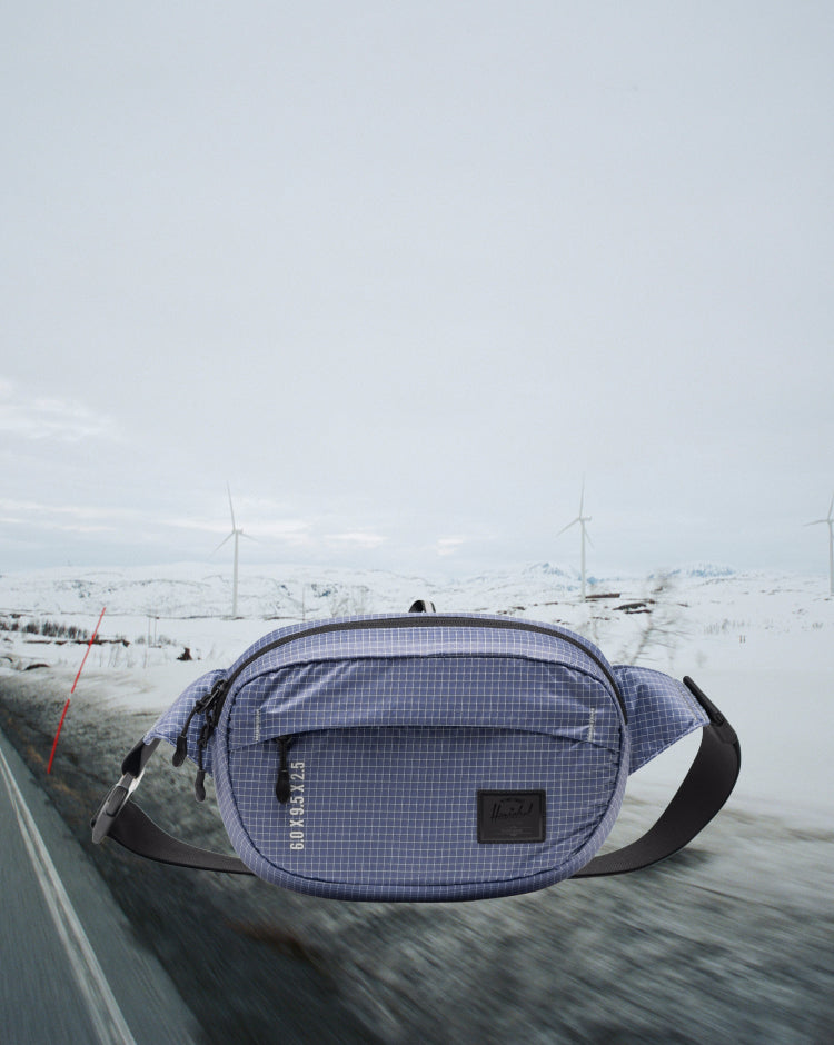 Herschel Supply Co Ultralight Hip Pack 2 L in Heron/Black. A lightweight, grey and black fanny pack shown in a mobile hero image.