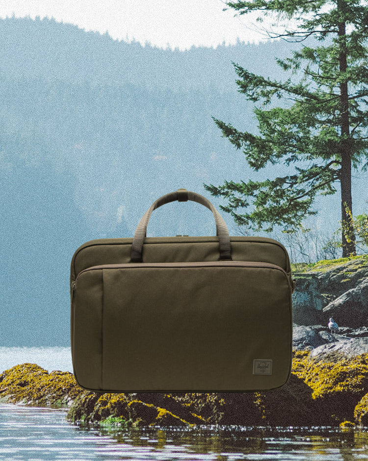 Herschel Supply Co. Bowen Convertible Travel Duffle Tech in Ivy Green Tonal, shown from the front.