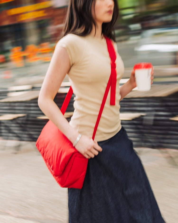 Herschel Supply Co. Cloudform Crossbody bag in Salsa red, shown from the front as a hero shot for mobile view.