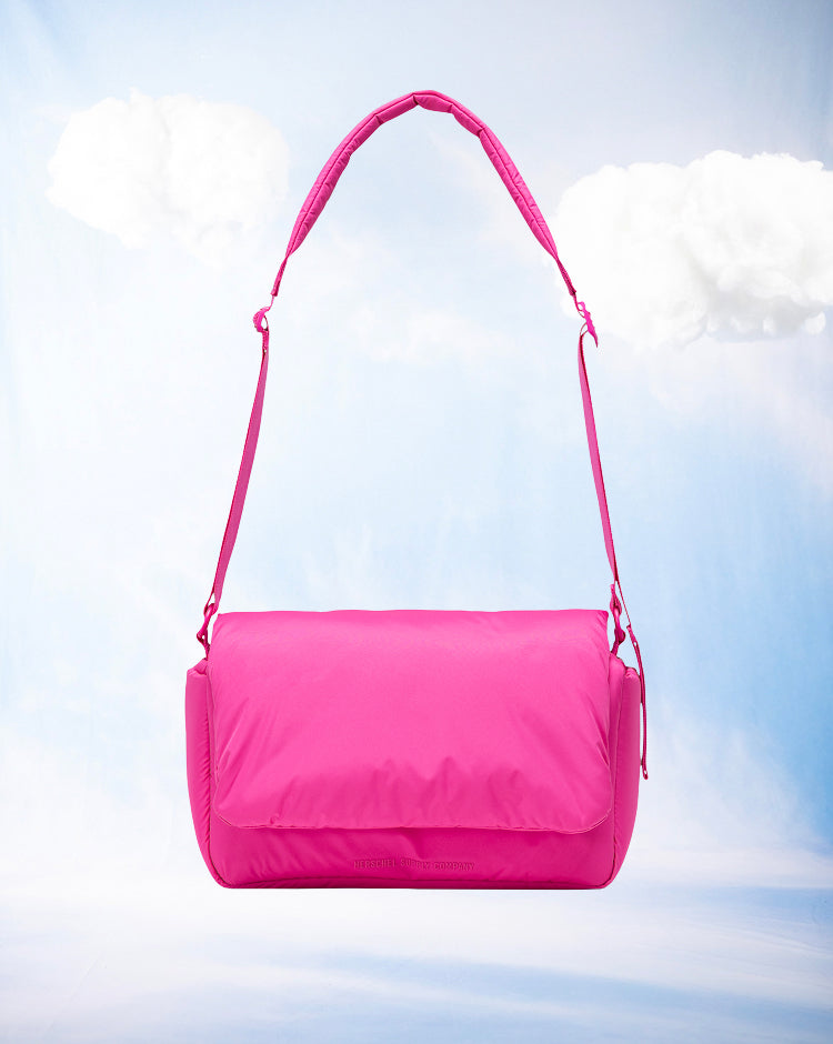 Herschel Supply Co. Cloudform Crossbody bag in Rose Violet, showing the front view.