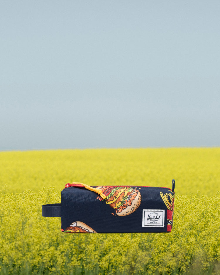 Settlement Pencil Case Little Herschel in two-tone blue and orange colorway featuring a zippered closure and a convenient side carrying handle.