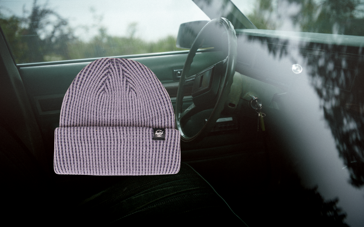 Herschel Supply Co. Rowan Plaited Beanie in Dusk Plaited, shown on a desktop banner.