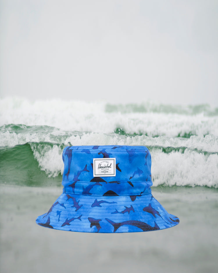Toddler bucket hat in sharks print by Herschel Supply Co for ages 2 to 4 years.