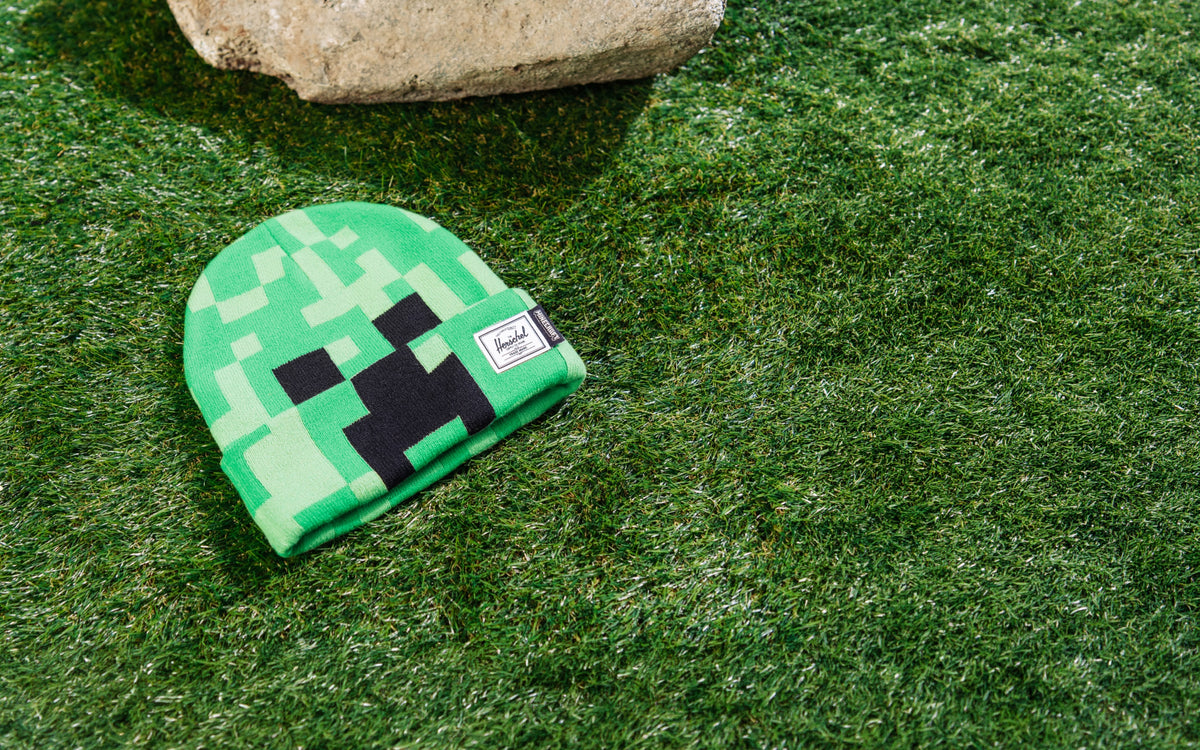 Kids Minecraft Elmer Beanie by Herschel Supply Co in Creeper green and black pixels.