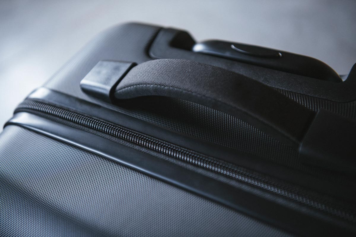 The padded top handle on the Herschel Trade Luggage Large suitcase